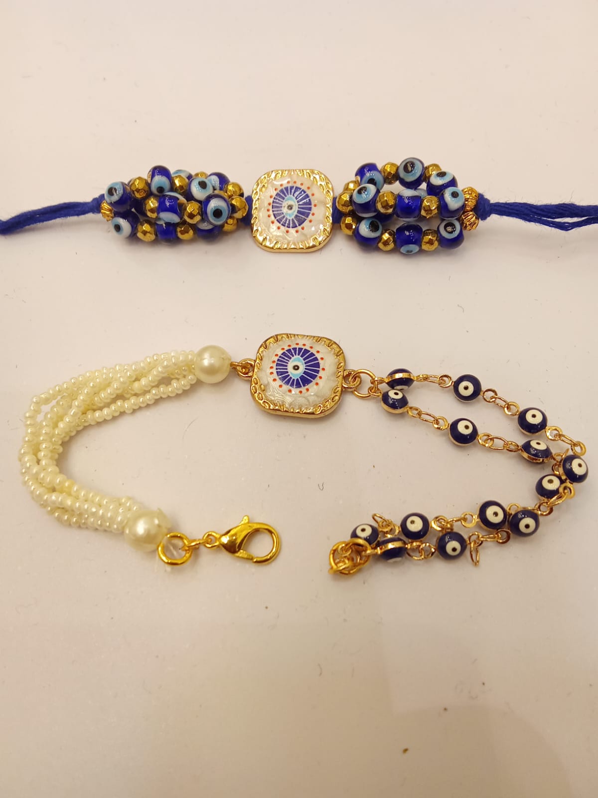 Evil eye with hematite pearl rakhi